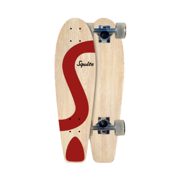 Skate cruiser rouge by Squête en bois de frêne local, une silhouette vintage et dynamique fabriquée artisanalement en France.